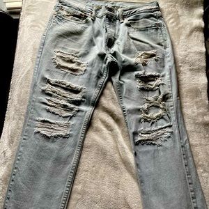 511 34x29 light blue distressed Levi’s jeans